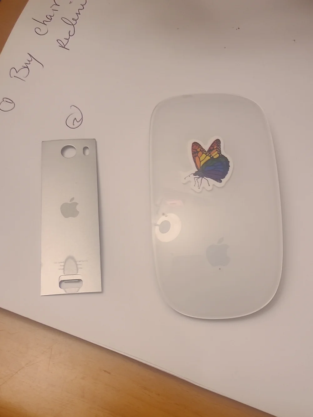 Apple Silver Magic Mouse with Exposed Battery Compartment and Duracell Cells